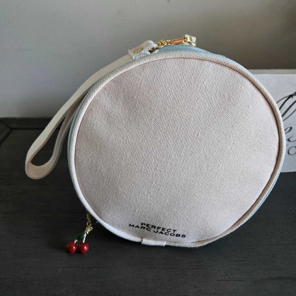 Marc Jacobs Cream Round Cosmetic Bag with Cherry Charm